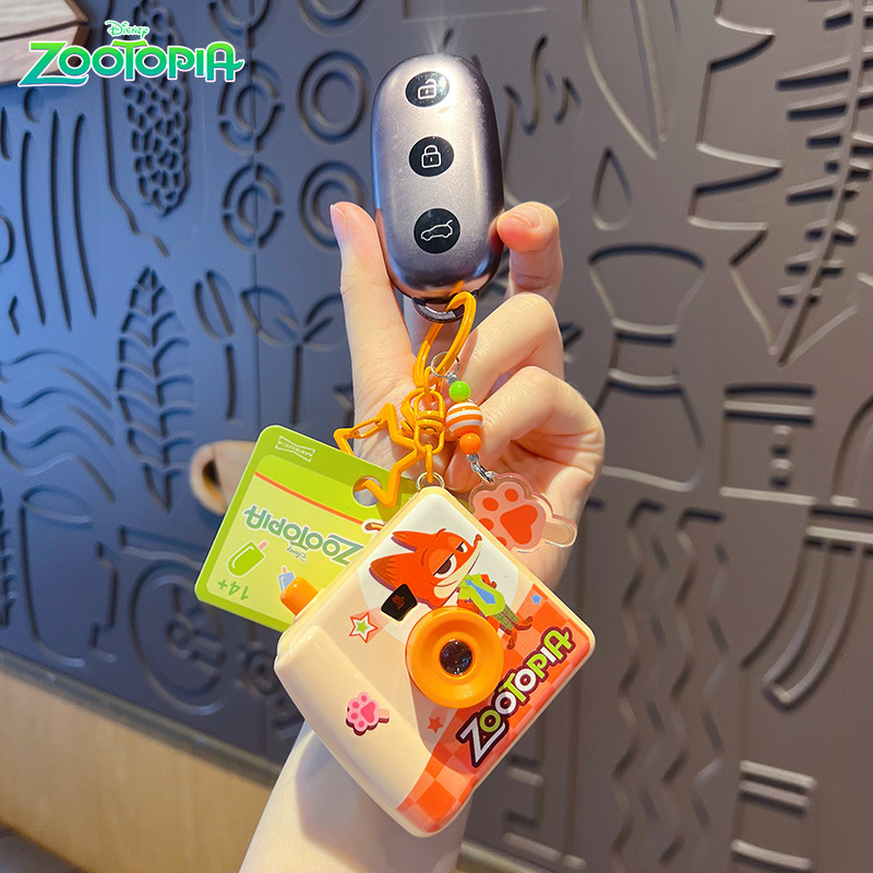 พวงกุญแจกล้องโพลารอยด์ซูโทเปีย - Party Games Kids บทวิจารณ์และราคา